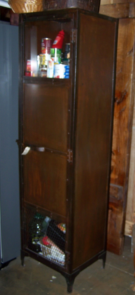Image of Industrial one door glazed metal cabinet