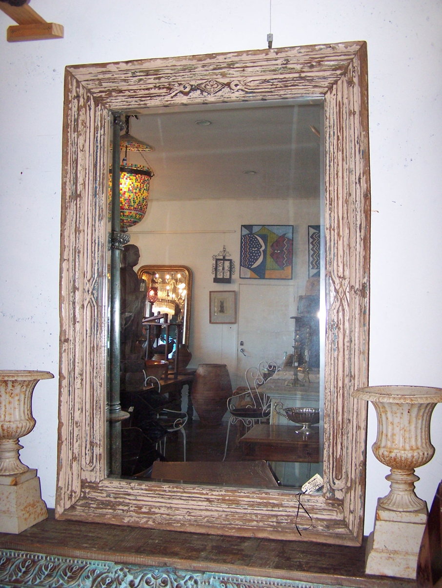 Image of Mirror with antique carved painted frame
