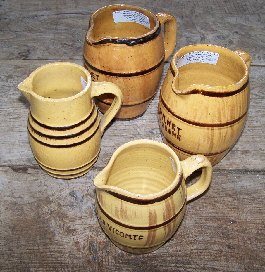 Image of French vintage pottery wine jugs